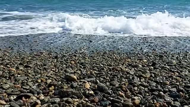 First-person view of the gravel beach