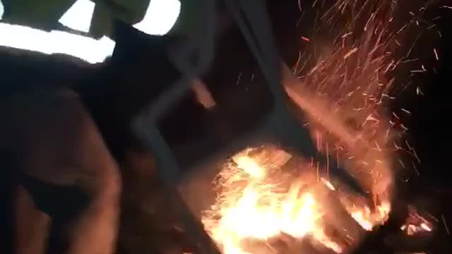 Sitting on bonfire
