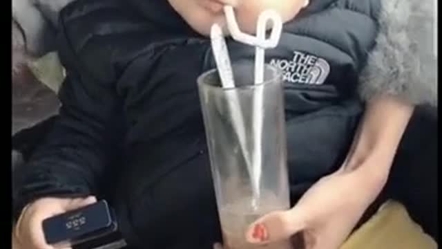 Bon did not drink but blew bubbles in the glass