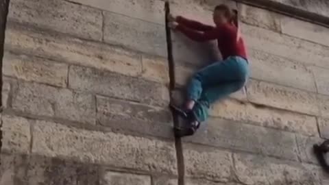Beautiful women climbing high walls