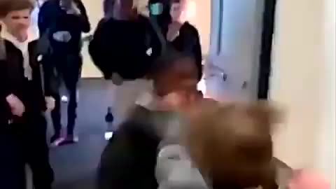 2 Kids Scrap It Out In The School Hallway