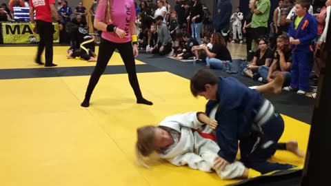 Girl fights boy gi jiu jitsu