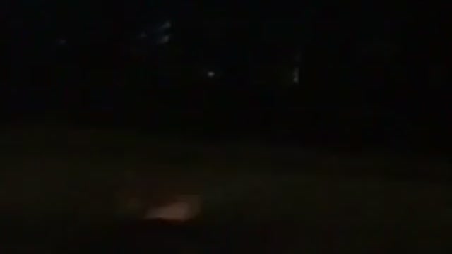 Guy attempts cartwheel on concrete wall falls and is laughed at