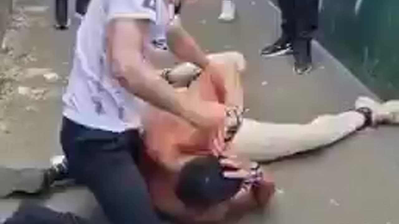 Street fight in an alley