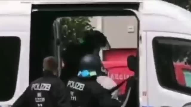 German police beating a man half to death for refusing to wear a mask