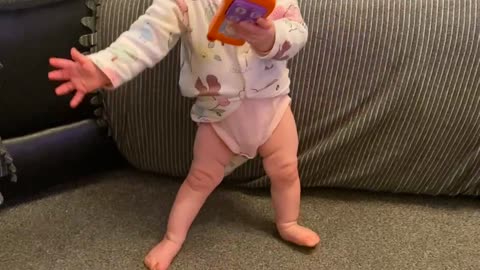 Babies first steps are caught on camera