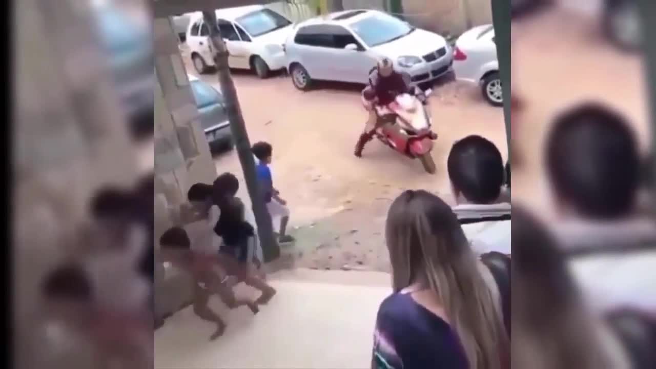 Tough biker shows off; stunt falls flat...