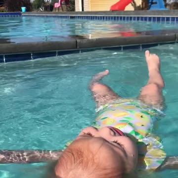 Lana 2 year old jumping in and floating
