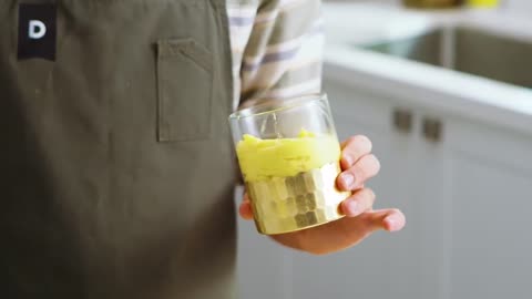 Put the yogurt and mango chunks together in a blender and blend