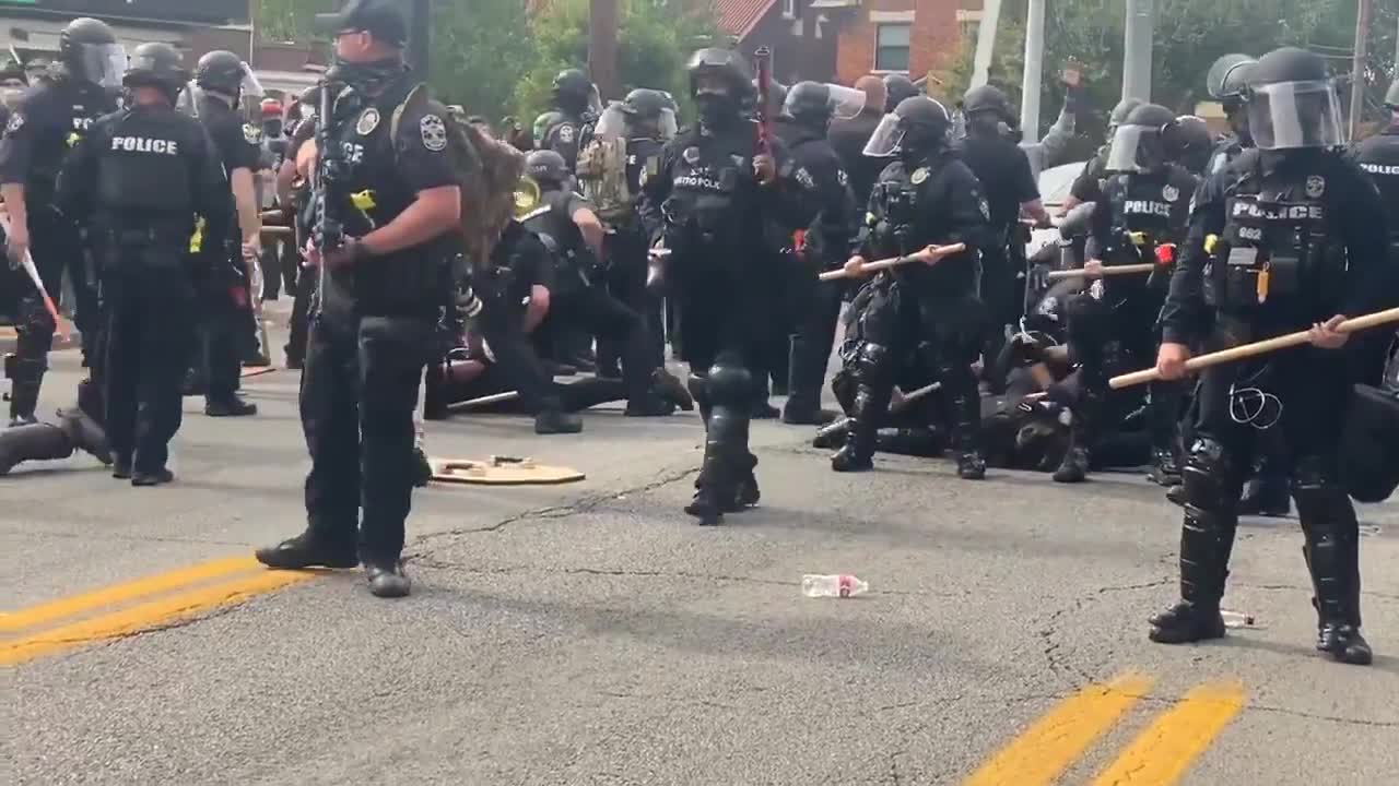 No one is to cross in front of the Black women Louisville