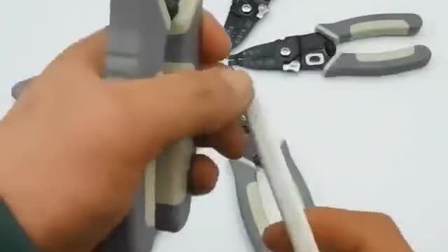 Wire stripping crimper tool