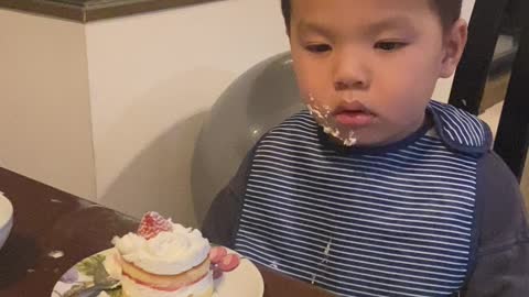 Young Boy Struggles to Stay Awake at Dinner