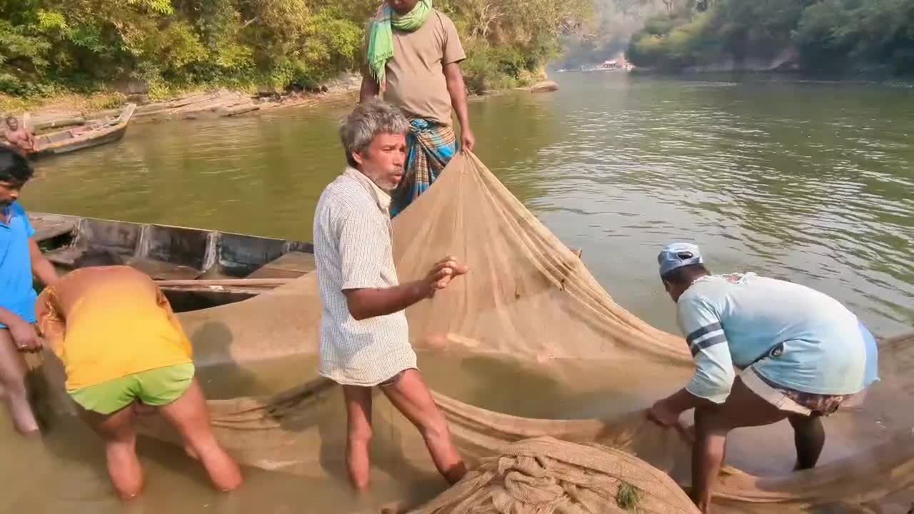 Pahari fishermen catch river fish.