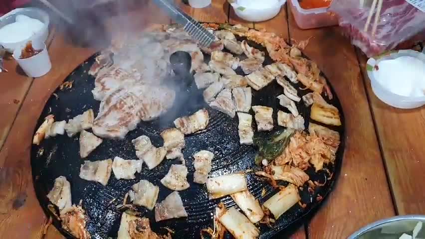 the process of baking pork belly with a lid