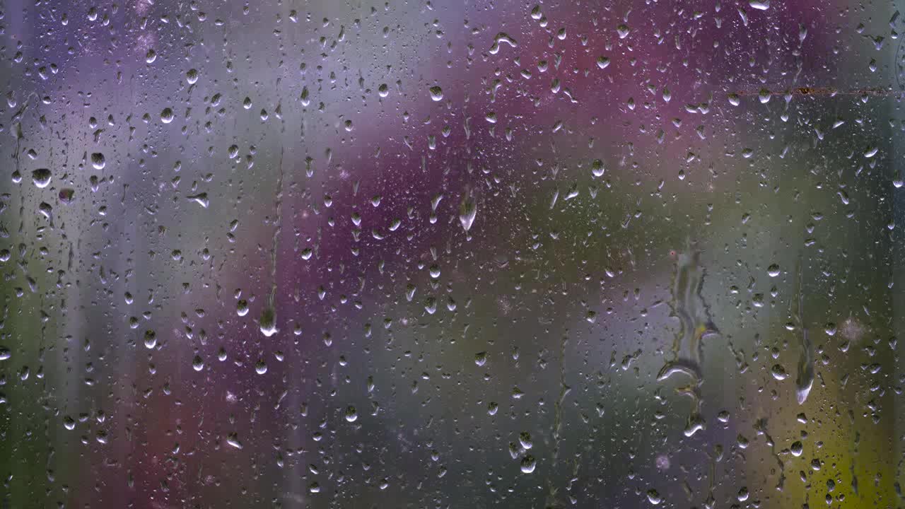 Close Up Shot of Rain Droplets On Window