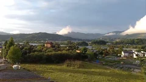 A leisurely countryside view from a high-rise apartment.