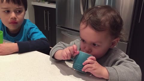 Little Boy Drinks Juice Loudly To Annoy Brother