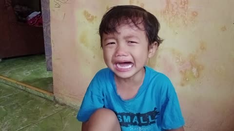 The boy is crying