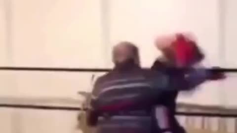 ELDERLY MAN BOXING YOUNGER MAN, AGE DOESN'T MATTER IN THE REAL WORLD