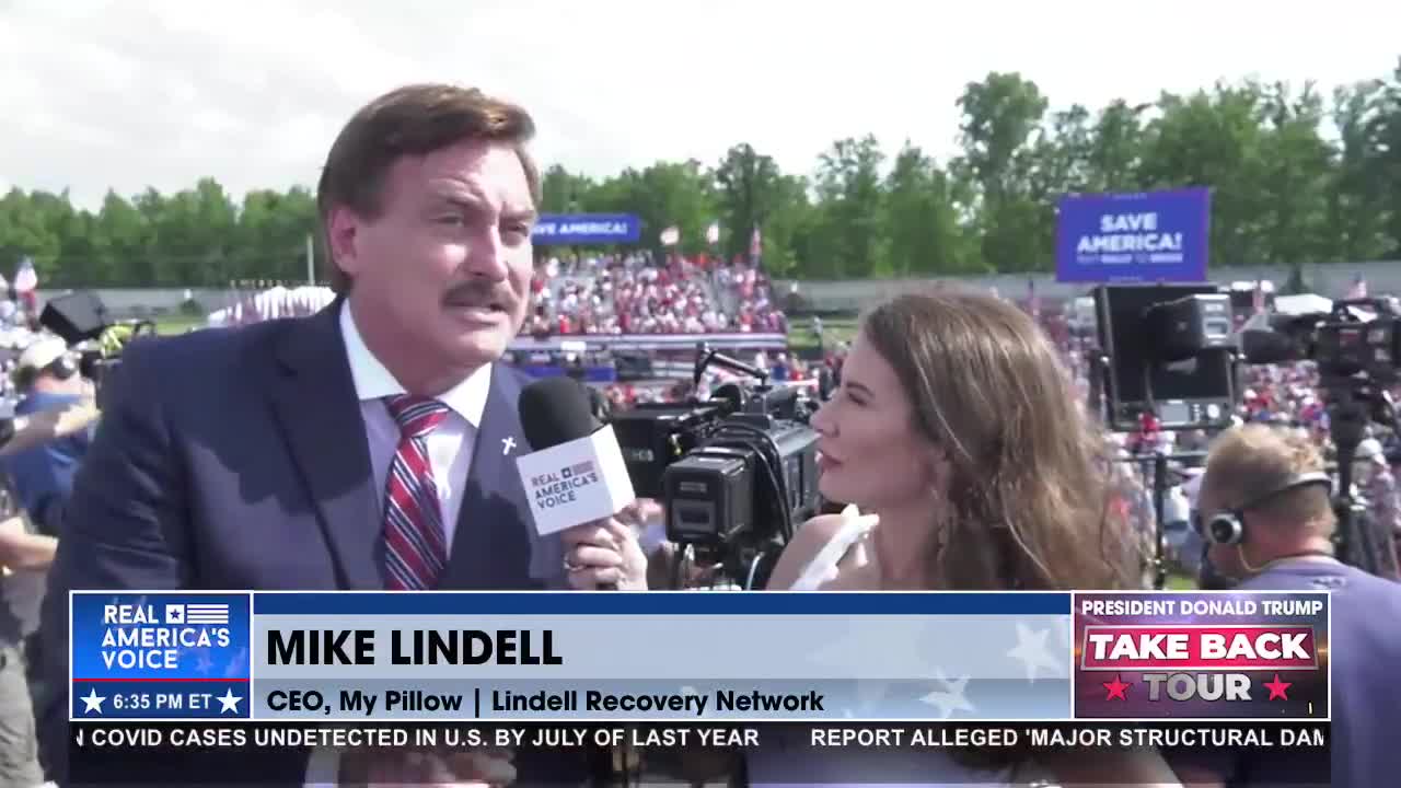 Mike Lindell talks with Amanda Head at President Trump’s #TakeBackTour