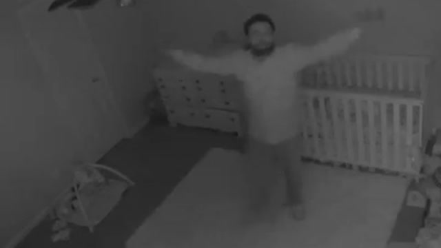 Funny Dad Celebrates Putting Baby To Sleep By Bowing At The Baby Monitor