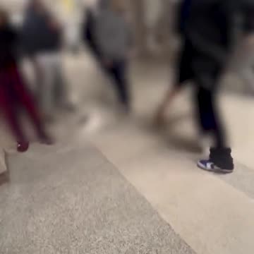 Terrifying moment gang of FIVE masked intruders storms Washington high school