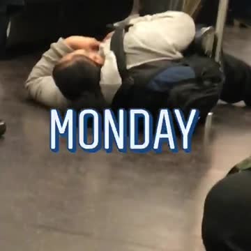 Monday woman asleep on subway car floor
