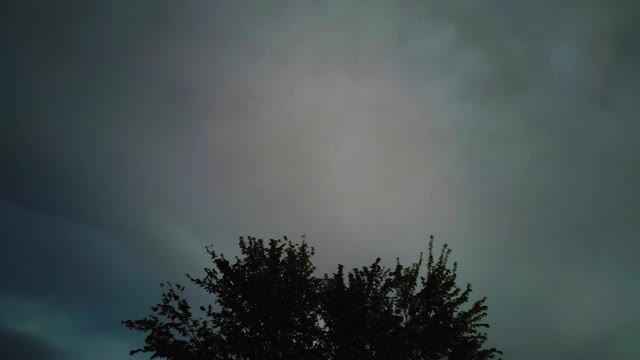 Timelapse of cloud movement in the night sky.