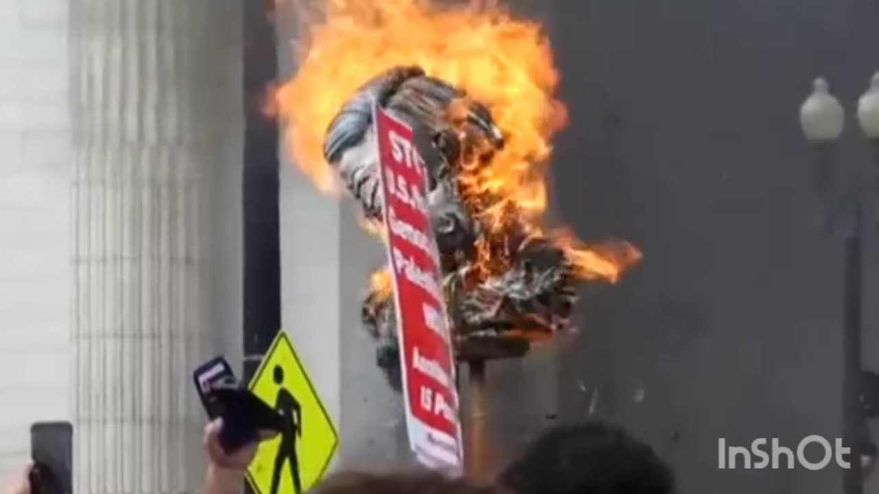 Protesters burn American flag at Union Station and raise Palestinian one in its place