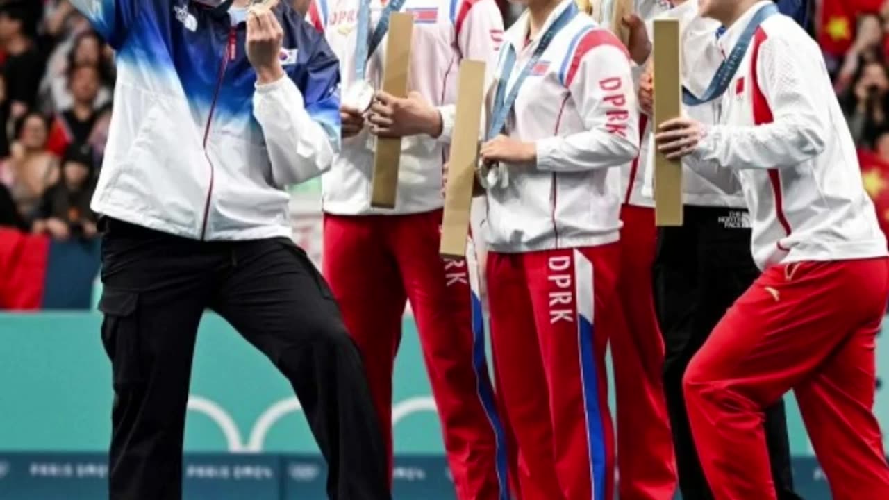 North and South Korean Team Pose For Selfie Together at Olympics 2024