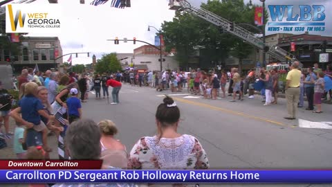 Carrollton PD Sergeant Rob Holloway Returns Home.