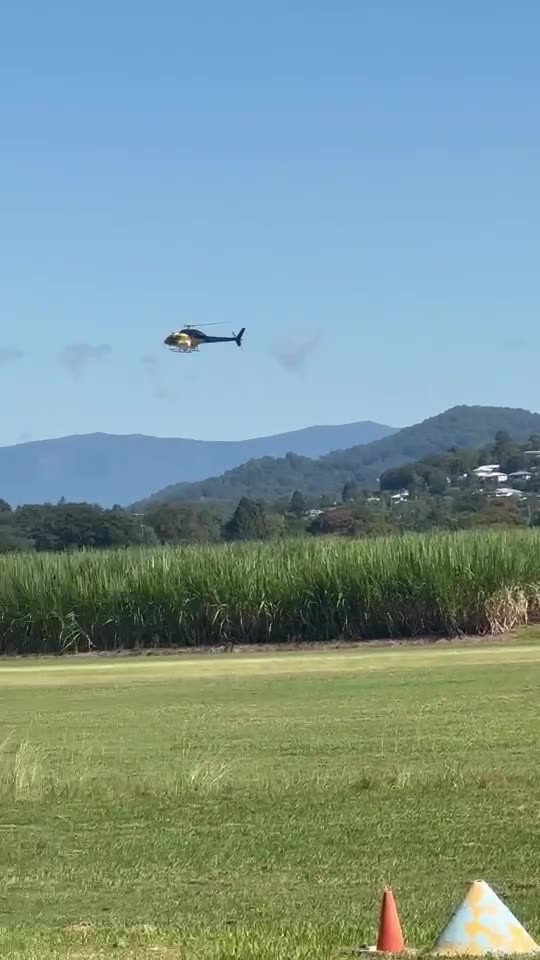 Chopper at Murwillumbah, NSW spraying deadly fire ant poison.