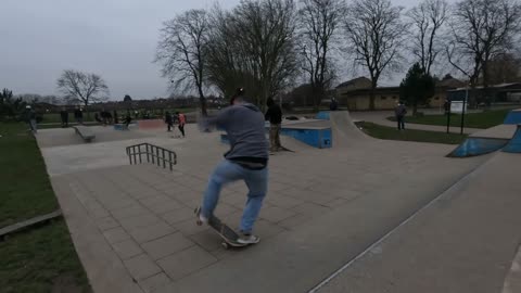 Skateboard stunts at Walthamstow London rink in the afternoon.