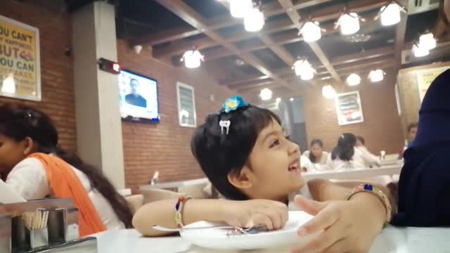 Hungry Amaira in Restaurant