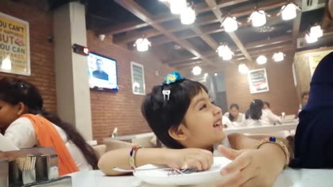 Hungry Amaira in Restaurant