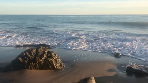 Waves Washing Over Rocks