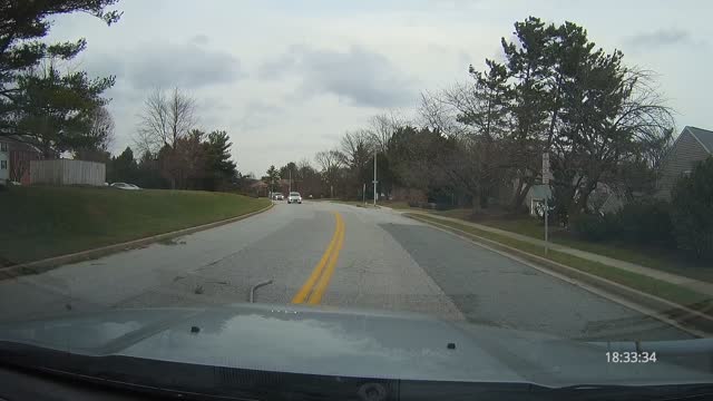 Heavy Winds Knock Light Pole onto Car