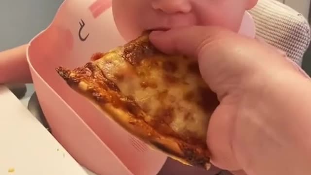 This baby trying pizza for the first time is amazing. Baby reaction so so cute😍😢