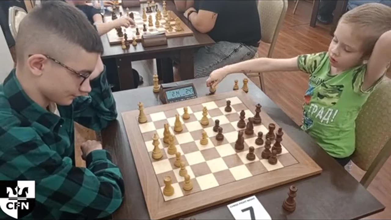 Little chess player surprise every one in hall