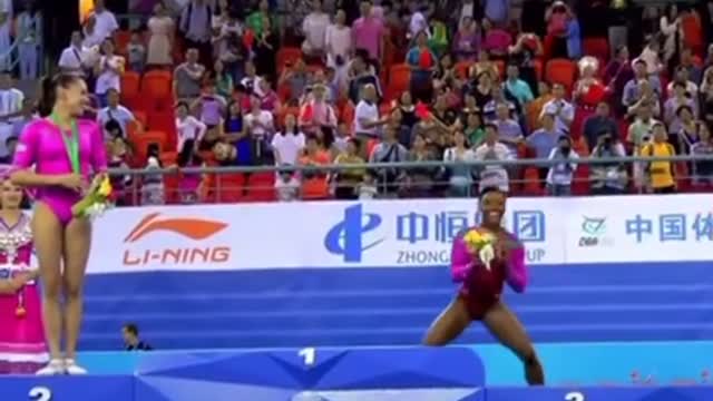 Bee scares Simone Biles