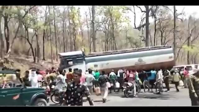 Villagers near the accident of a fuel tanker in India rushed to grab the oil after hearing the news