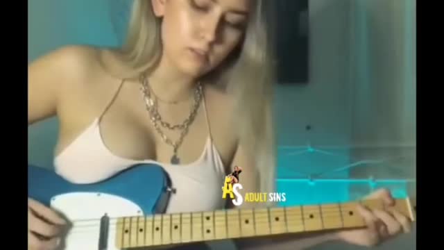 Guitar playing girl.