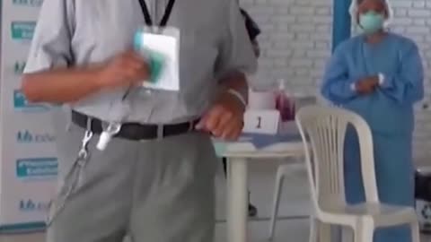 Elderly man dances after receiving COVID-19 vaccine