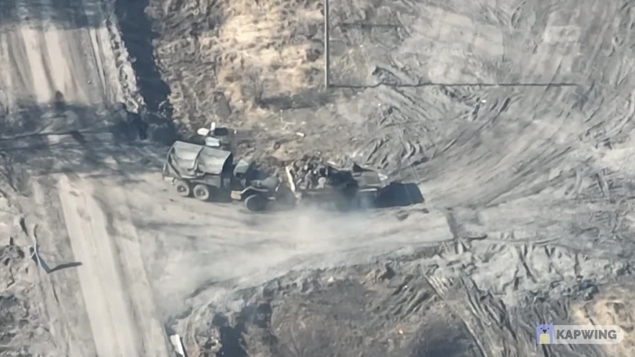 Russian IFV with truck moving on the battlefield