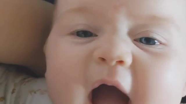 Baby gets scared and starts laughing