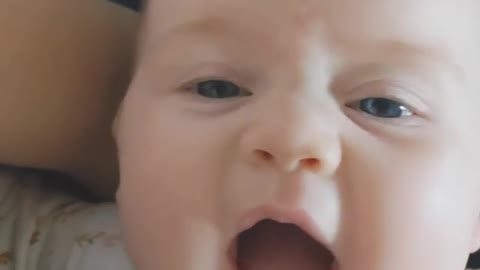 Baby gets scared and starts laughing