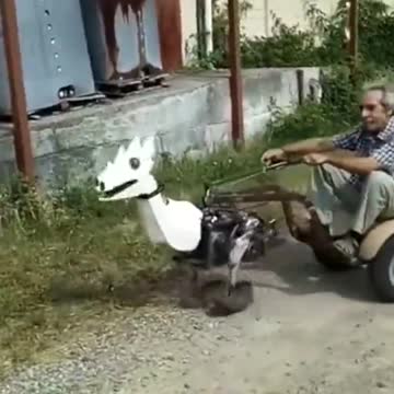 Man and his homemade vehicle