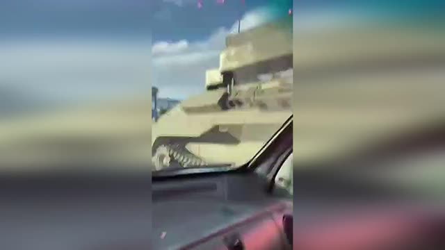 Ukrainian local Fighters throw Molotov at towed tank trying to destroy it - Molotov gone wrong