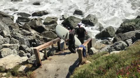 Surfers Have Close Call With Big Waves