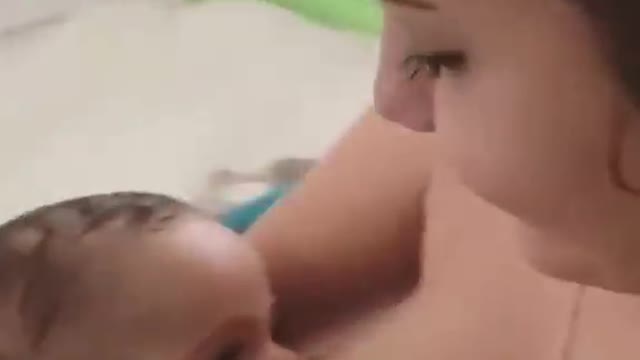 Mother Feeding Baby